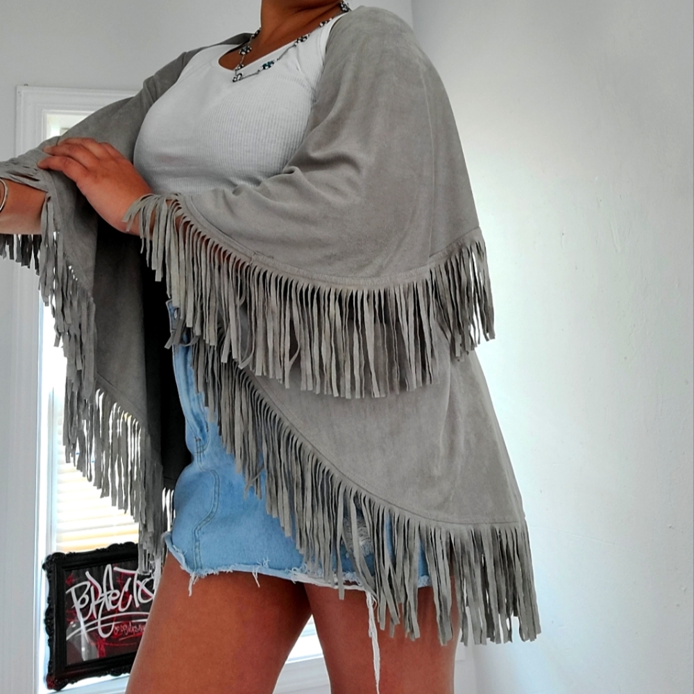 Fringe vest cowboy vibes